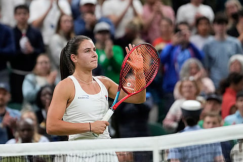 Emma Navarro celebrates after defeating Coco Gauff